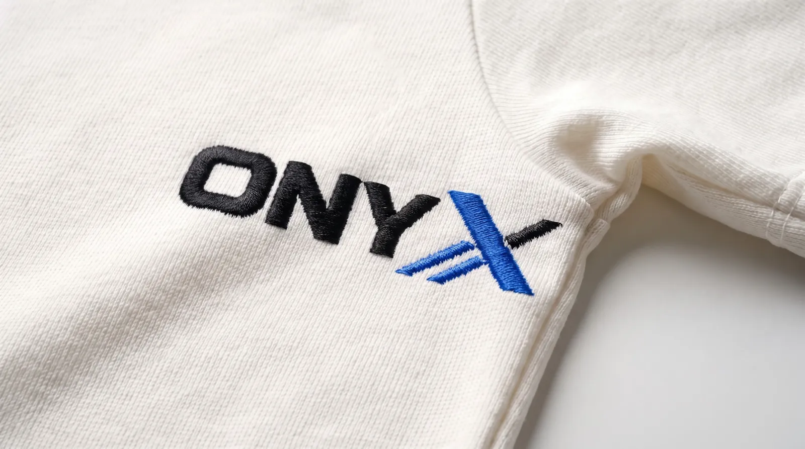 Embroidery close-up of the Onyx logo